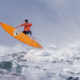 Tyler Fox flies out of a wave during the second heat of the first round of the Mavericks Invitational big wave surf contest Friday, Jan. 24, 2014, in Half Moon Bay, Calif. (AP Photo/Eric Risberg)