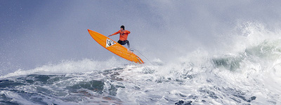 Tyler Fox flies out of a wave during the second heat of the first round of the Mavericks Invitational big wave surf contest Friday, Jan. 24, 2014, in Half Moon Bay, Calif. (AP Photo/Eric Risberg)
